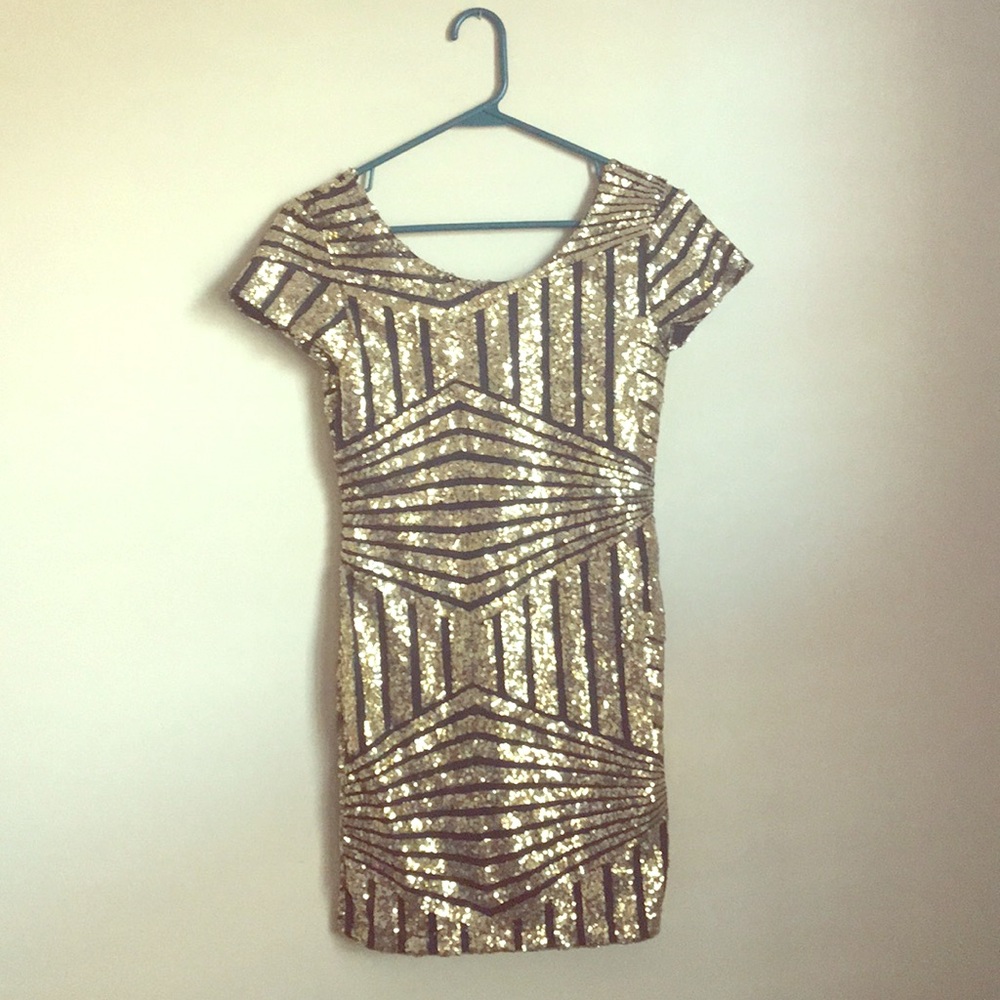 Gold sparkly cocktail dress great for New Year’s!
