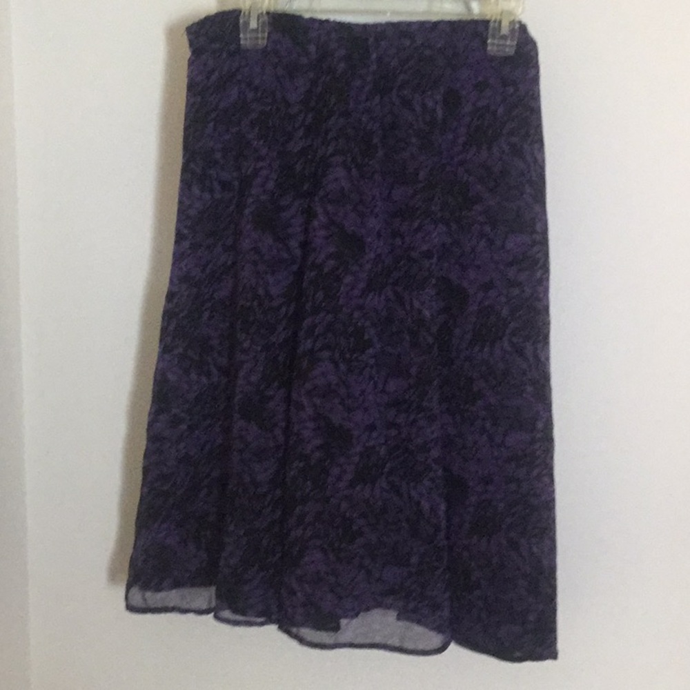 Lined skirt.  Length asymmetrical 24-26”