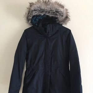 The North Face knee length navy blue winter coat