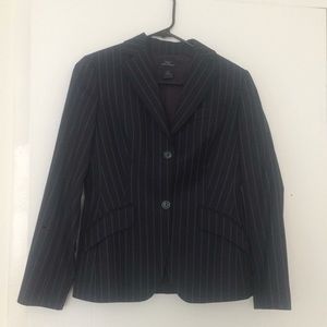 Brooks Brothers pinstripe suit.