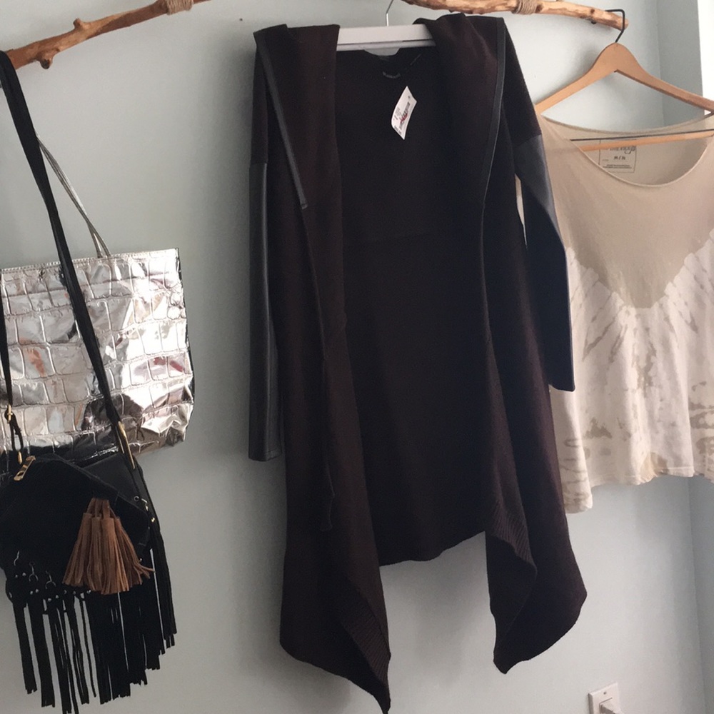 South moon under sweater/coat. Size Small