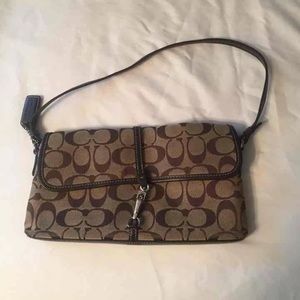 Tan and Brown Coach Clutch
