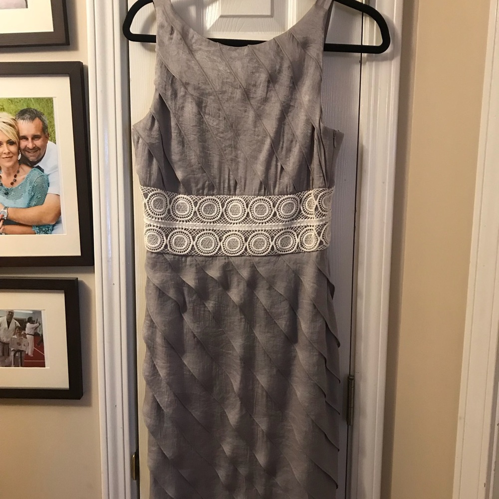 Unique New with tags elegant silver/gray dress