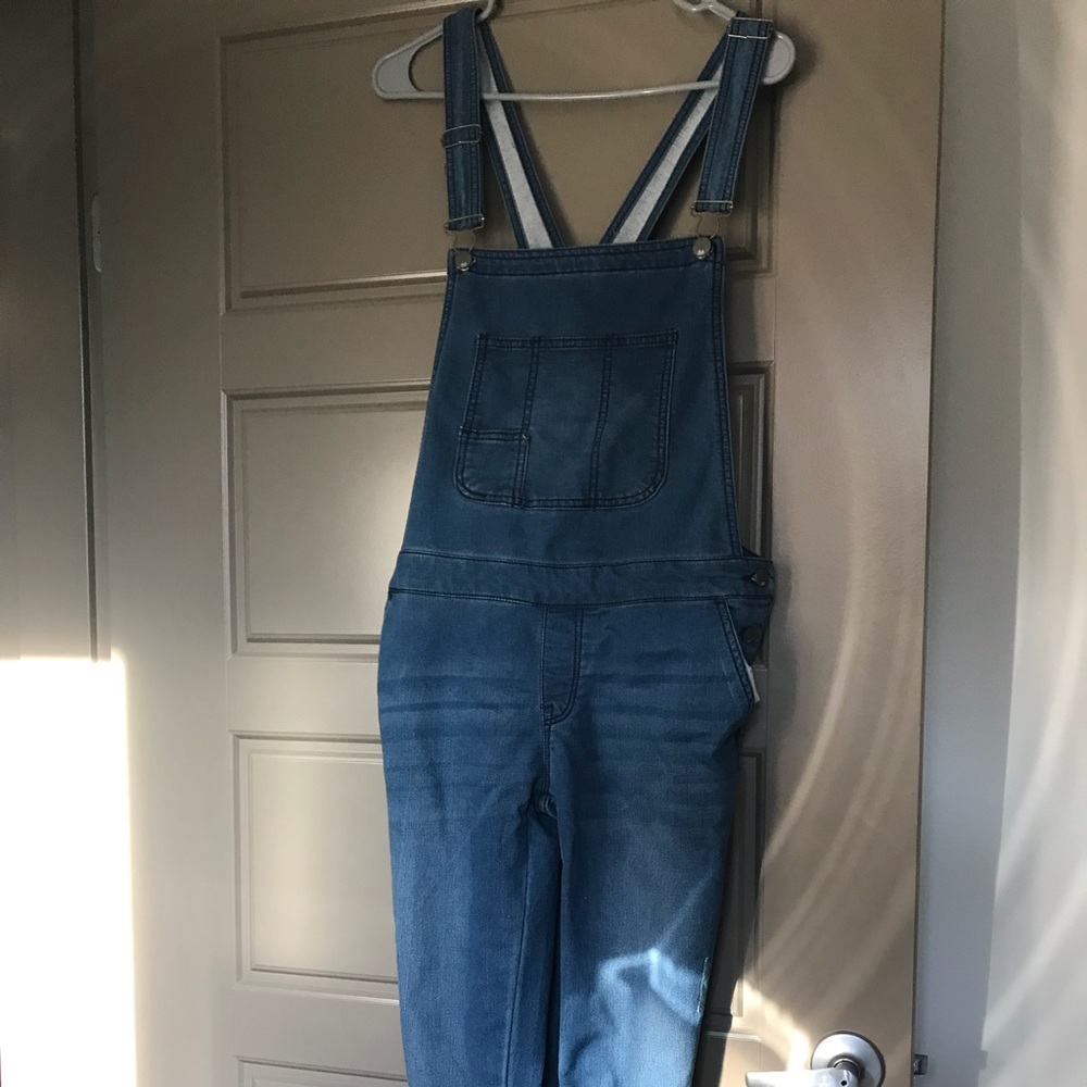 Denim, skinny over-alls.