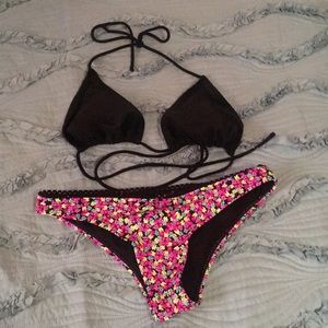 Black and floral bikini. Very sexy.