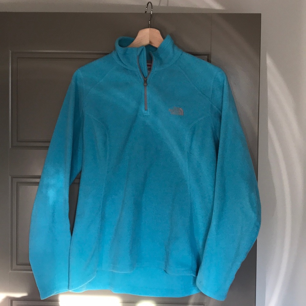 Bright blue Northface pullover.