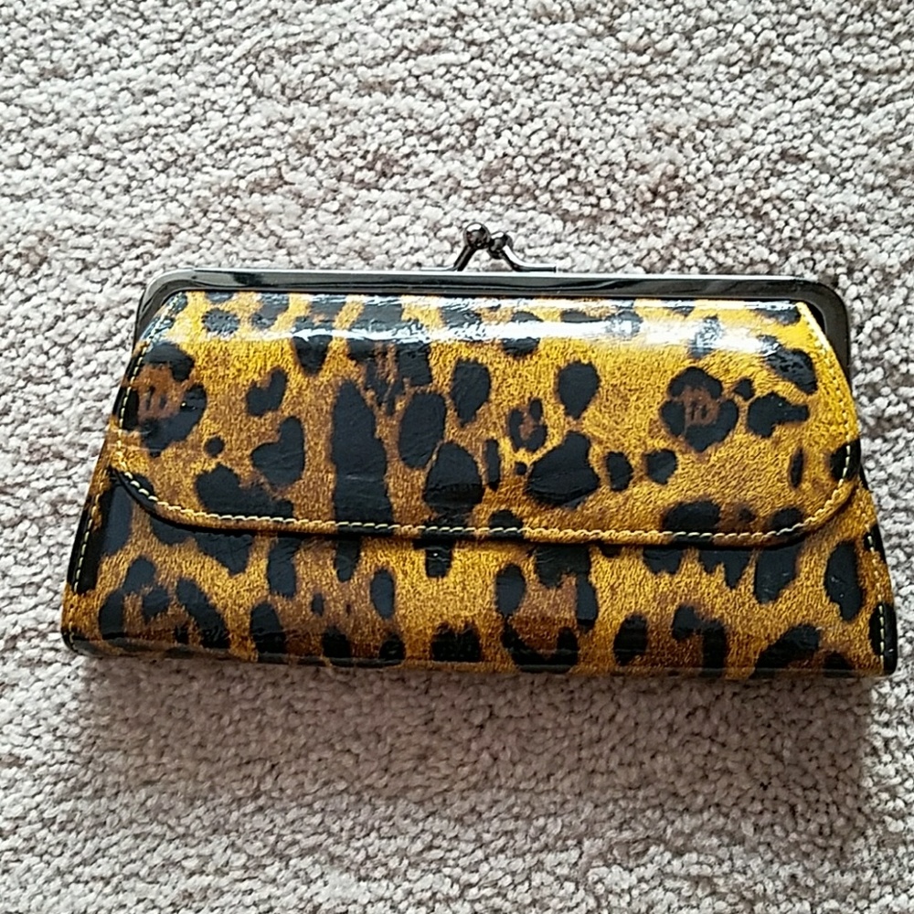 Cheetah print patent clutch.