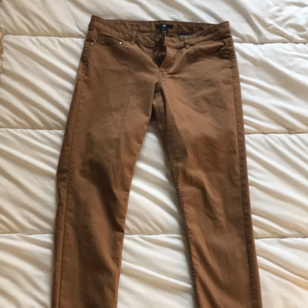 Dark tan, skinny pants.