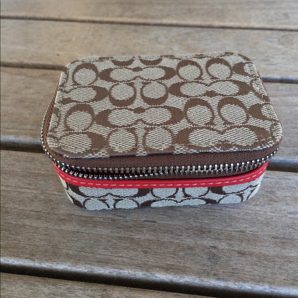 Coach pill case