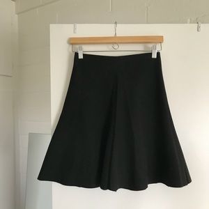 Soft, knee-length Zara skirt.