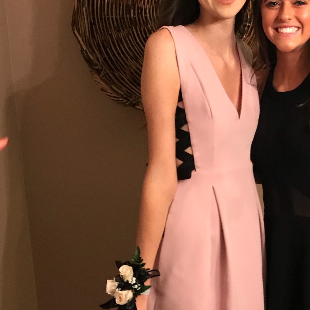 Pink dress with bows on side