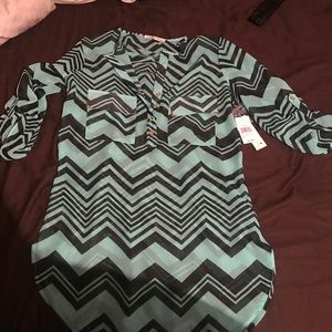 Stylish blouse never worn