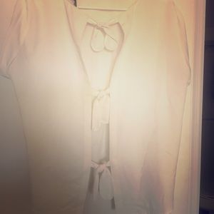 White blouse with open back