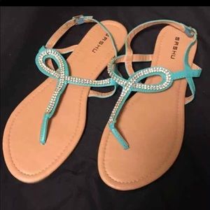 brown and teal sashu- t strap Sandlas