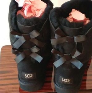 Gently worn W Bailey Bow Uggs with Sheepskin Care.