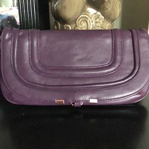 Plum clutch bag