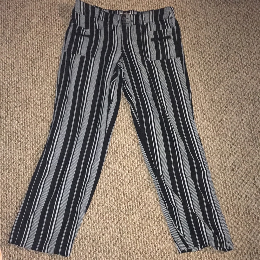 Black pants with white stripes