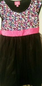 Girls beautiful sz 6 sequins & black dress below k