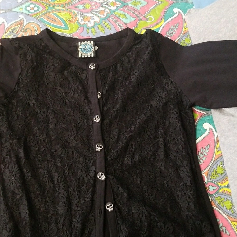 Skeleton buttons, and  black lace front, button up