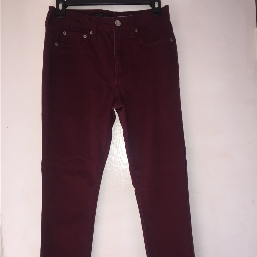Maroon high-waisted skinny jeans