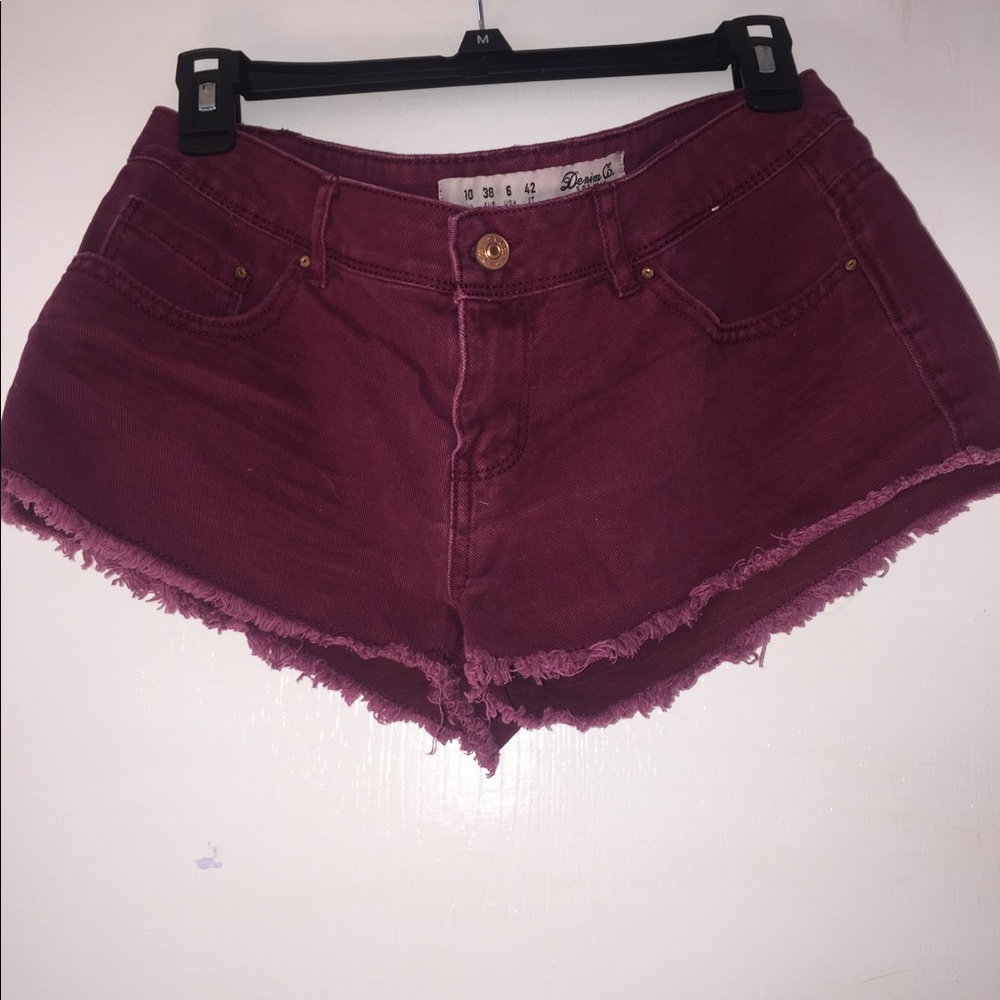 Maroon shorts with frill at the bottom