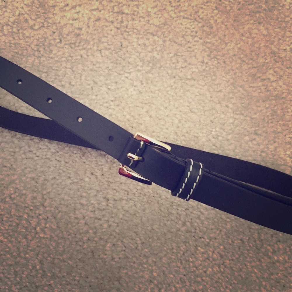 Chic black leather belt with funky white stitching
