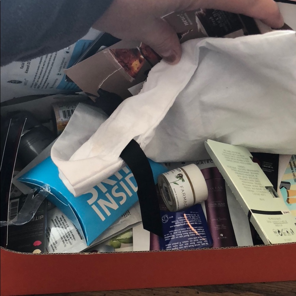 Nike box full of makeup samples and bags