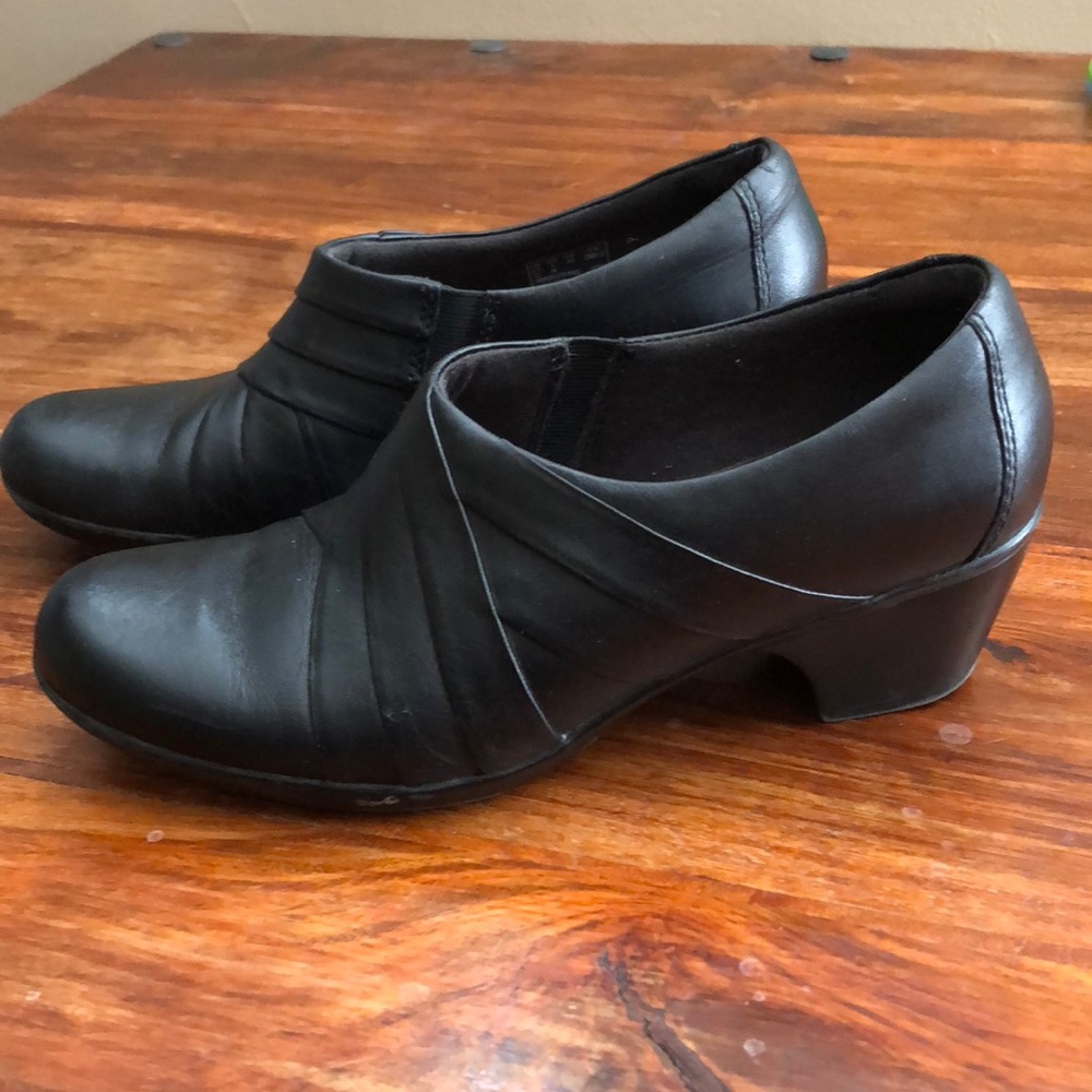 Clark’s black leather shoes