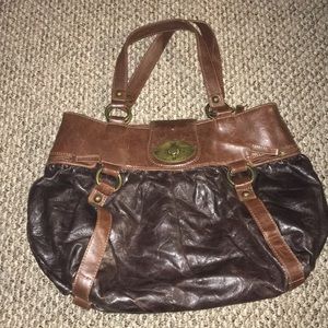 Brown leather front clasp side zipper tote