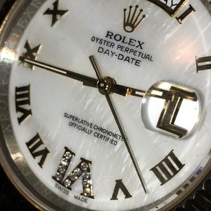 Men’s gold diamond Rolex