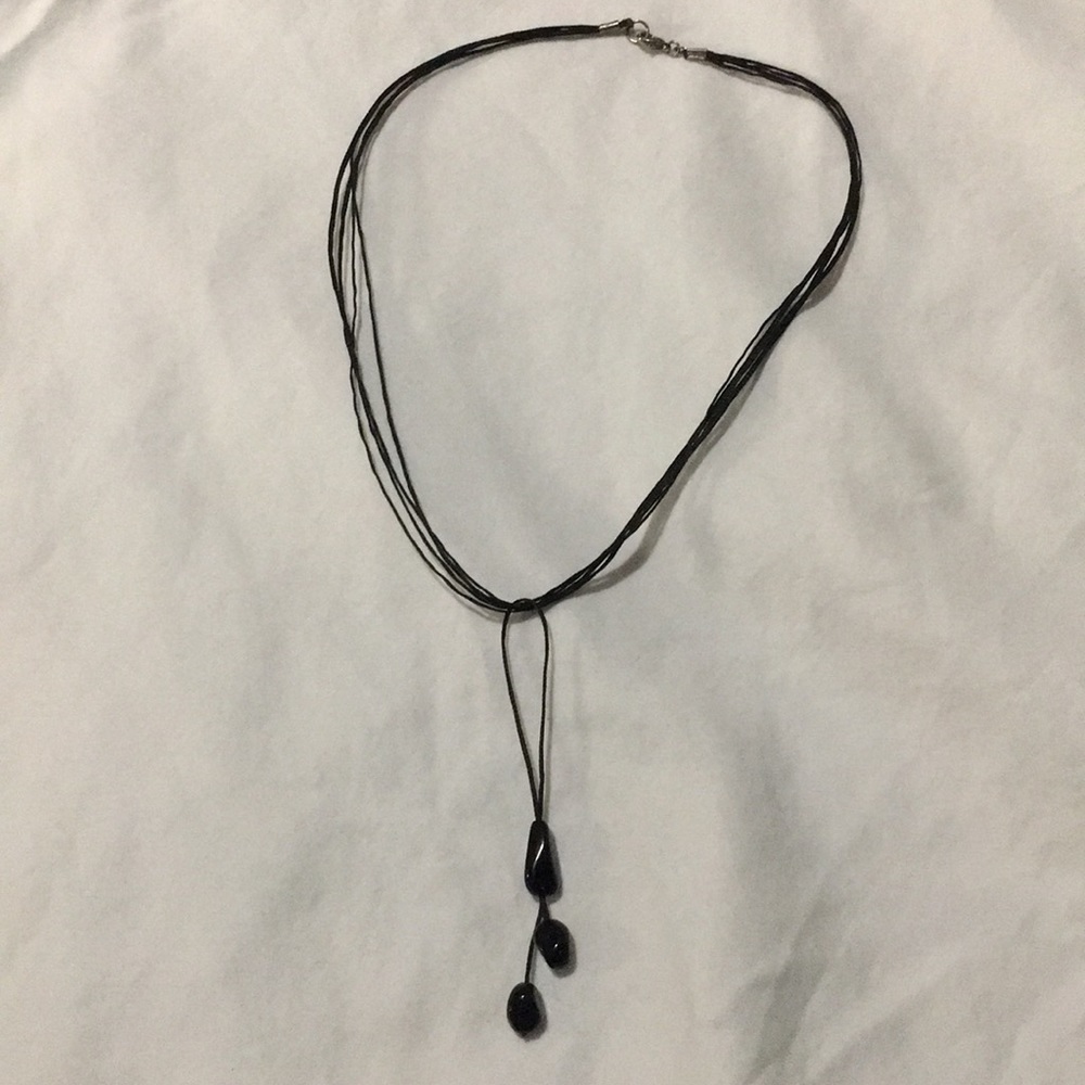 Black necklace.