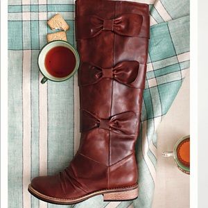 Anthropologie bow tied beauty brown leather boots