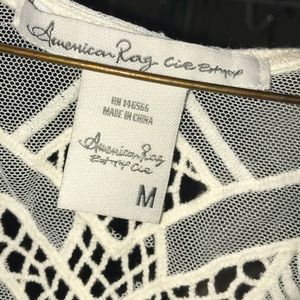 Open sleeveless cardigan