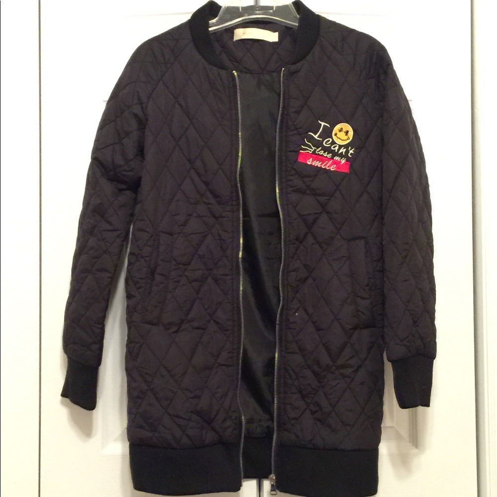 Long black quilted jacket