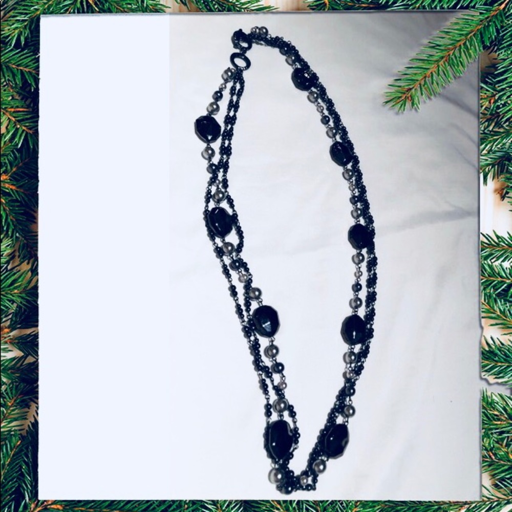 Long, layered necklace