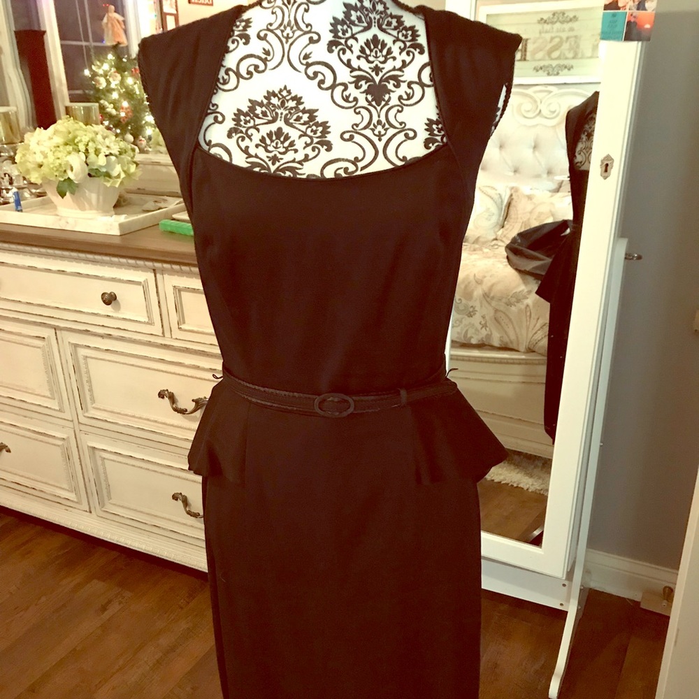 Peplum Dress with Keyhole back and belt.