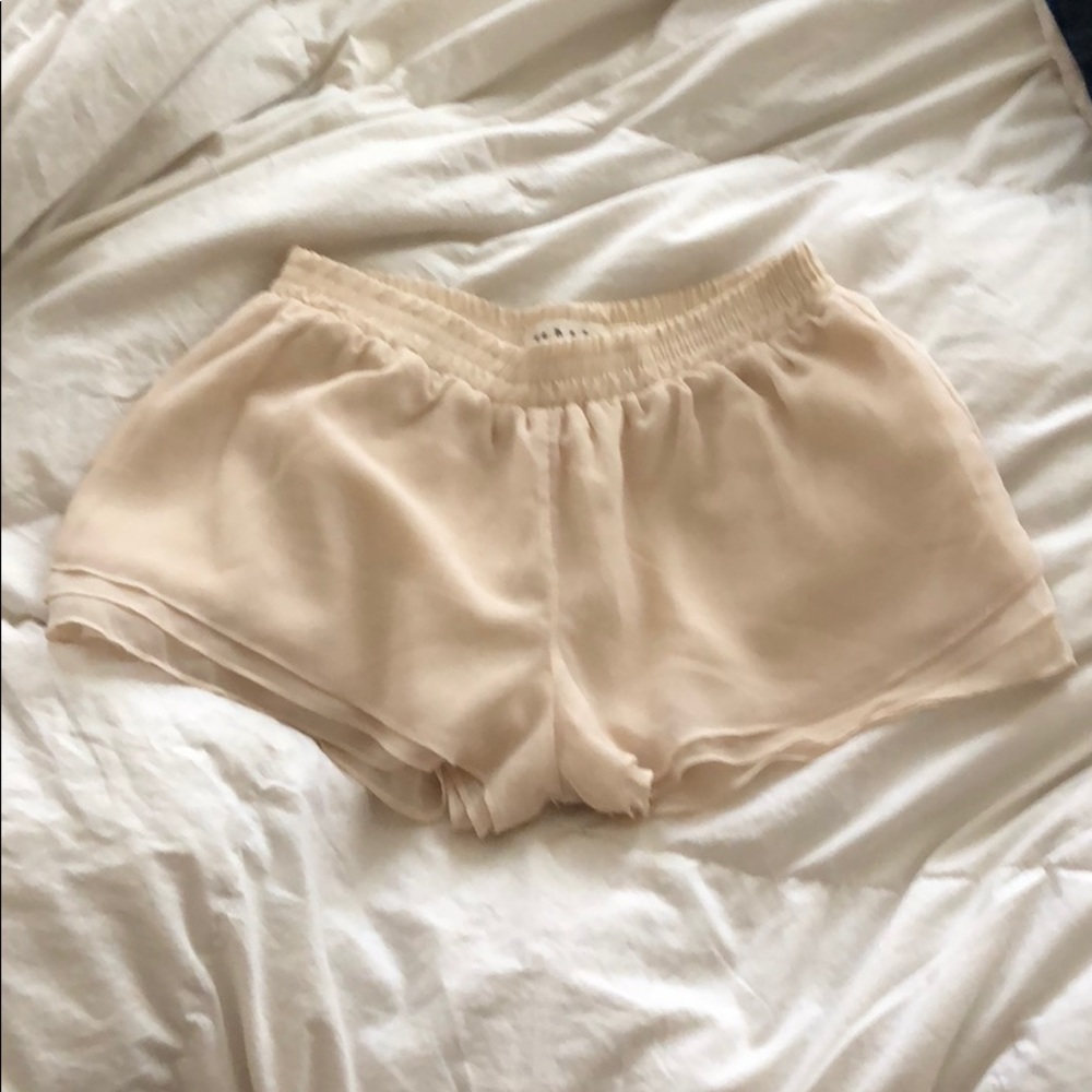 Cream boutique flowy shorts