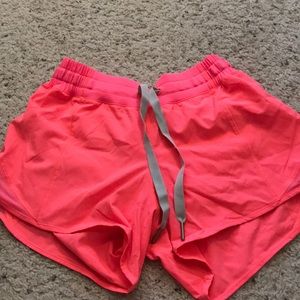 Bright pink lululemon shorts