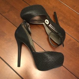 Black platform heels with crystal detail