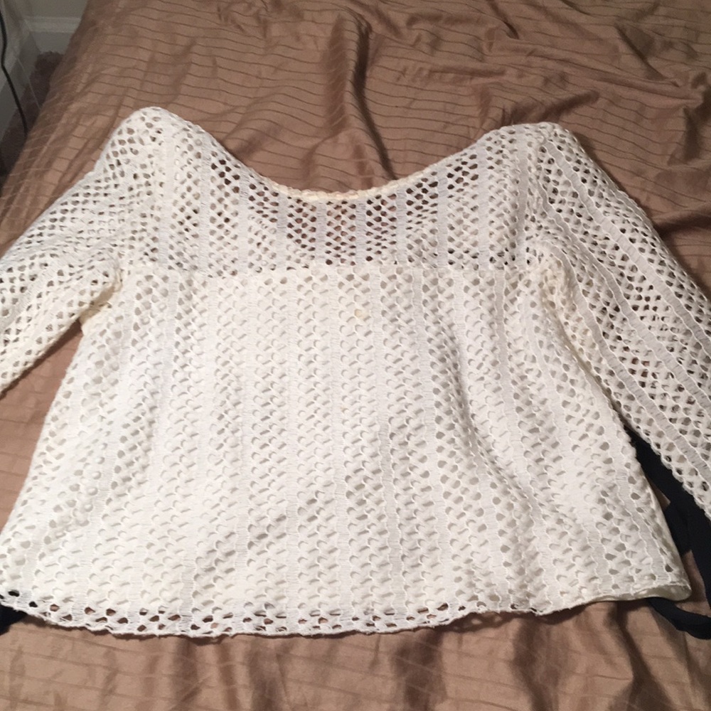 White shirt with strings in back