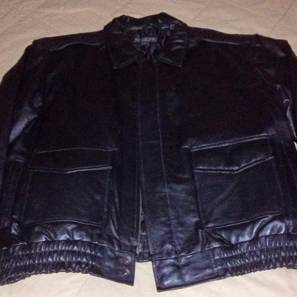 Black mans leather jacket by Cougar