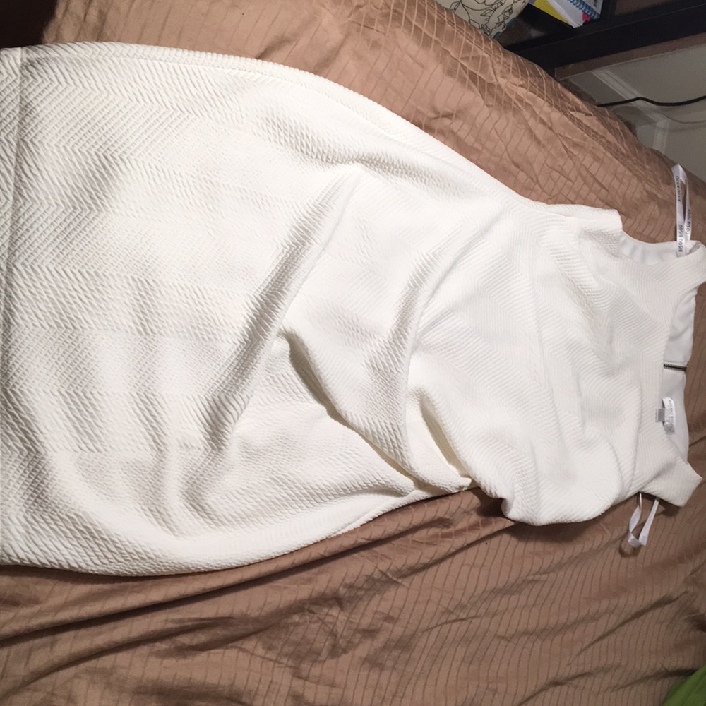 All white dress fairly new .. wore once