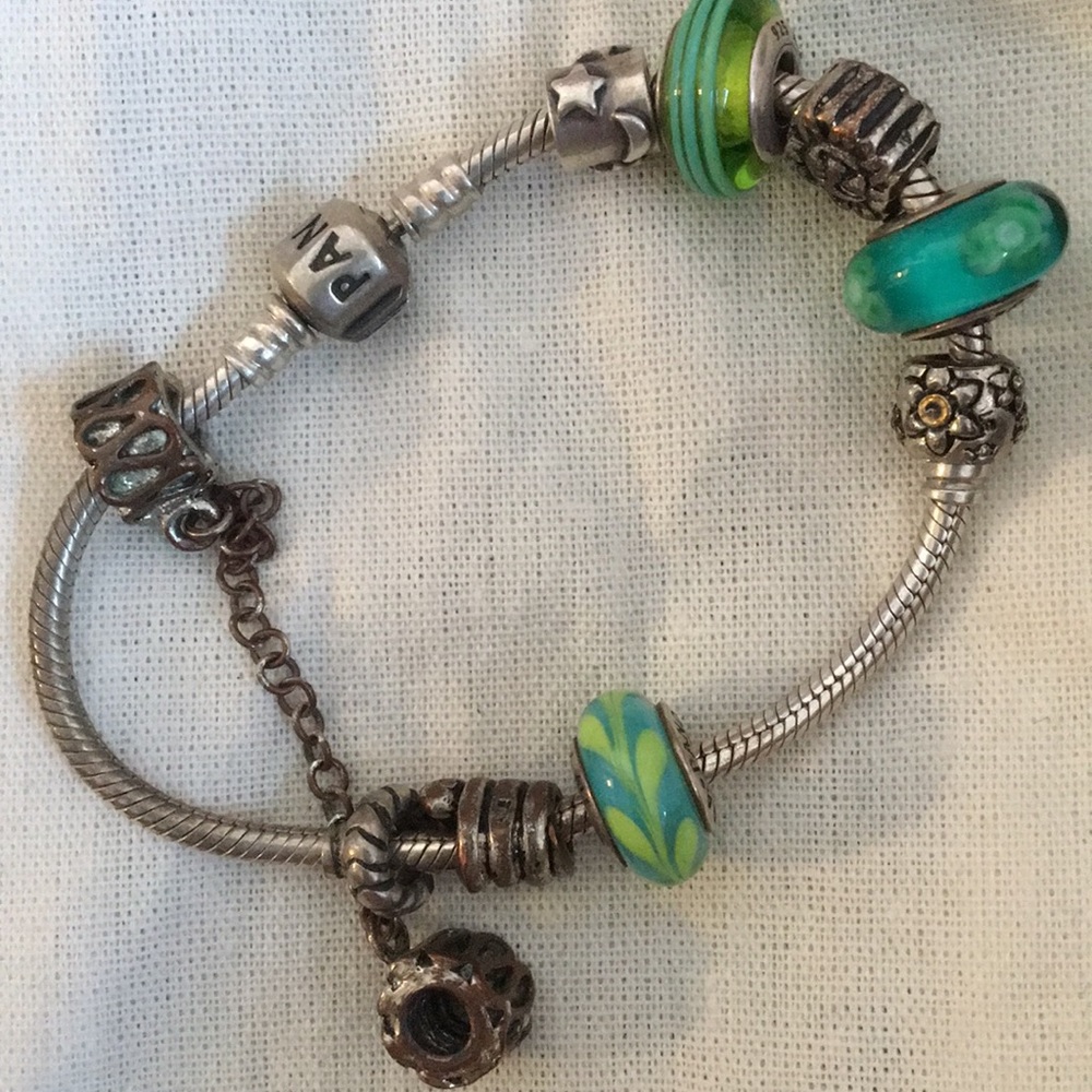 Pandora bracelet with glass pennants