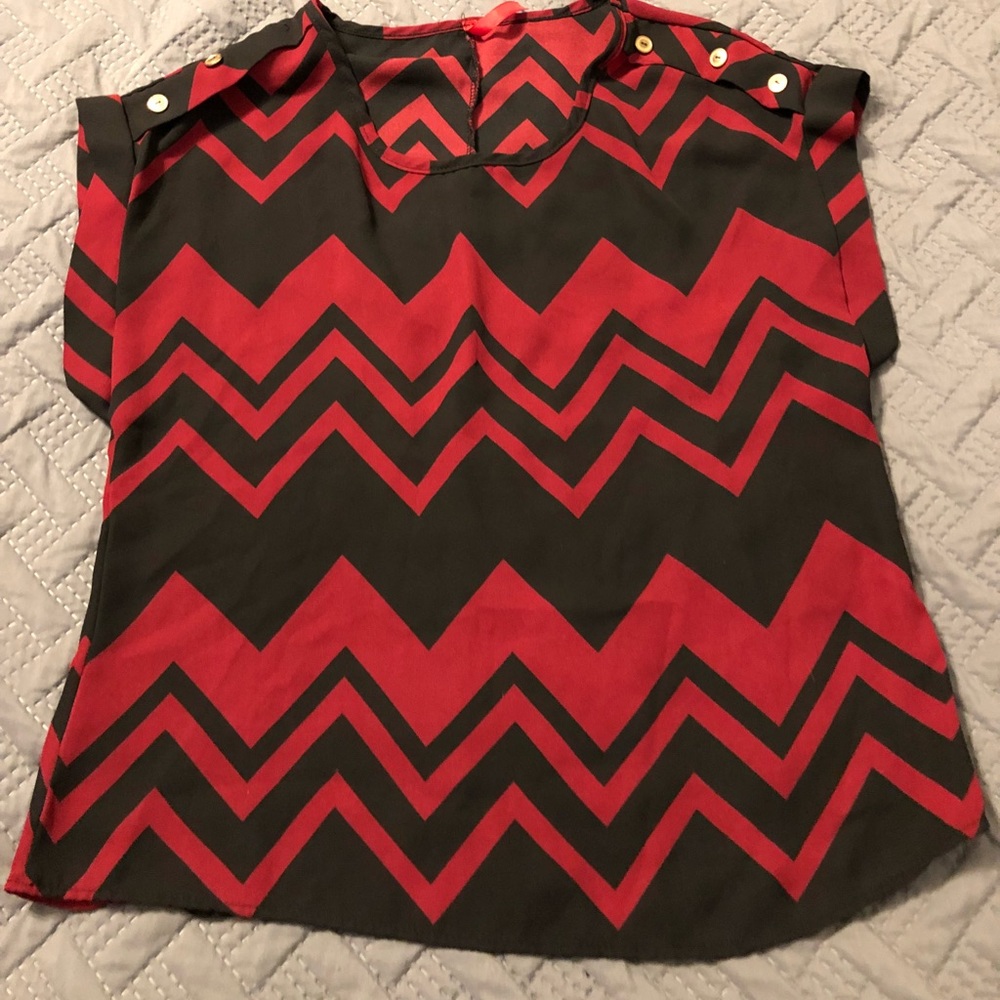 Red and black blouse.