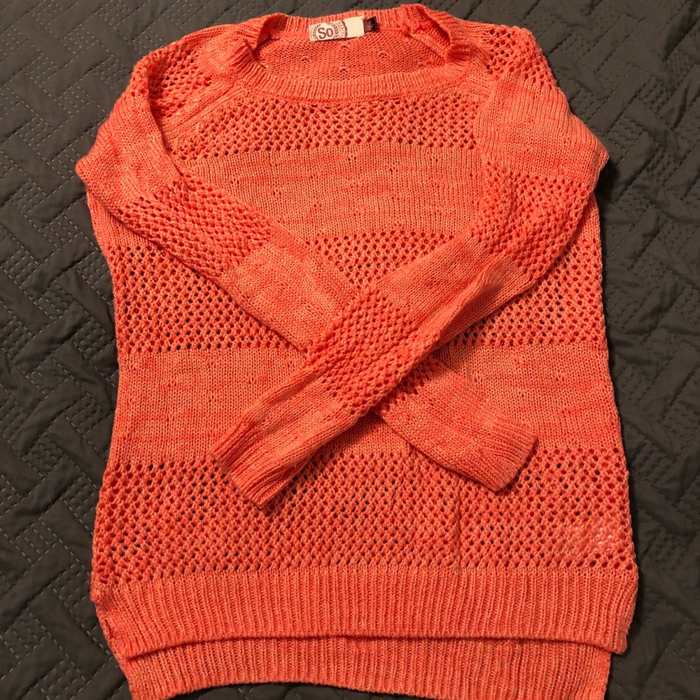 Knit sweater.
