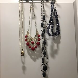 Four gently used assorted necklaces!