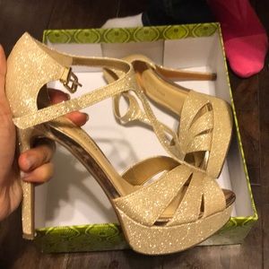 Gold strapped heels