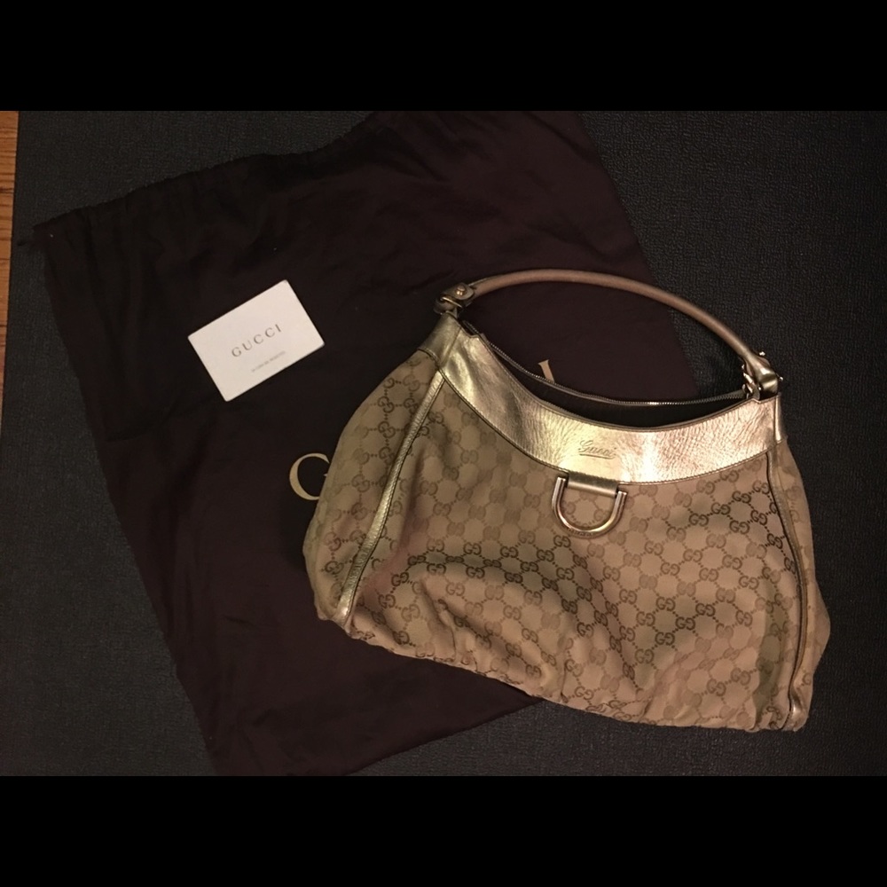 Gucci monogram large D Gold shoulder bag