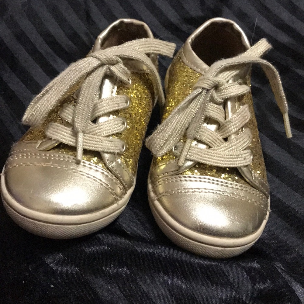 Gold sparkly sneaker