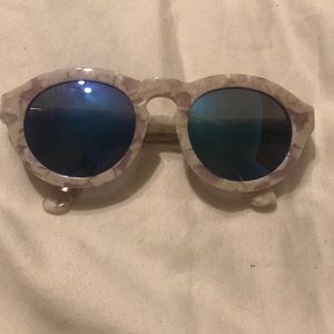 Dime white pearl frames with blue polarized lenses